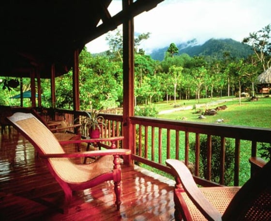 This luxury Lodge at Pico Bonito in La Cieba, Honduras, on 200 acres at the edge of the Pico Bonito National Park has 22 elegantly furnished cabins with verandas and hammocks. Each cabin is hidden behind verdant coffee and cacao trees, affording guests complete privacy.